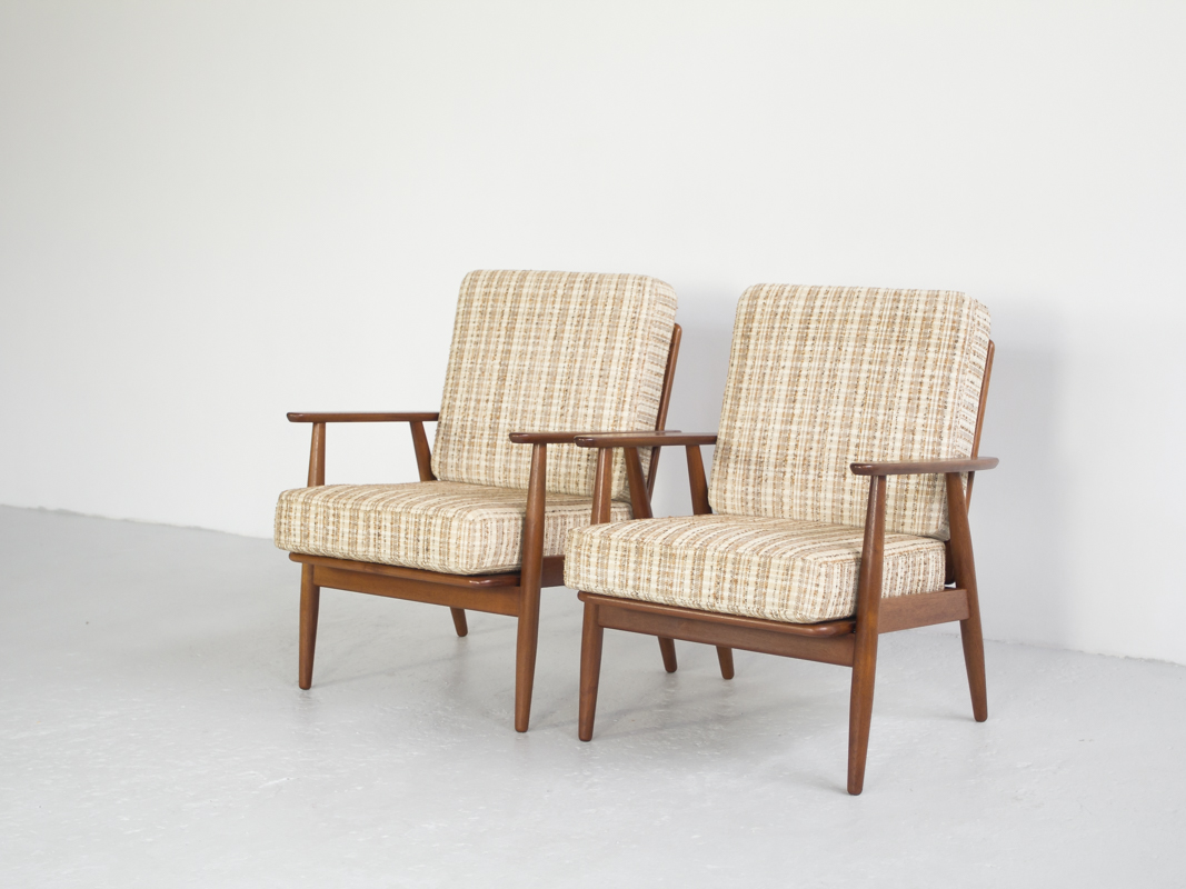 Danish pair of easy chairs in solid teak
