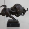 Abstract bronze statue of a bull, mounted on a solid black marble base - Signed by Max Milo