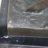 Abstract bronze statue of a bull, mounted on a solid black marble base - Signed by Max Milo