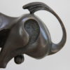 Abstract bronze statue of a bull, mounted on a solid black marble base - Signed by Max Milo