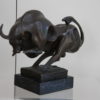 Abstract bronze statue of a bull, mounted on a solid black marble base - Signed by Max Milo