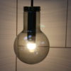 Pendant lamp of Raak in mouth-blown smoked glass with golden details - Produced in the Netherlands - '60's