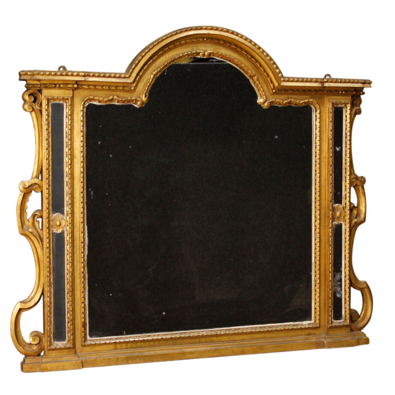 Italian mirror in carved and gilded wood