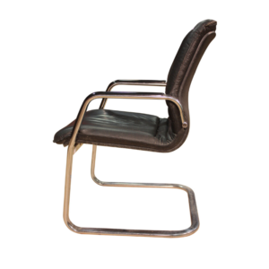 Designer armchair in plastic and fake leather