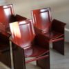Set of Four 20th Century Tito Agnoli Model Korium Burgundy Leather Armchairs