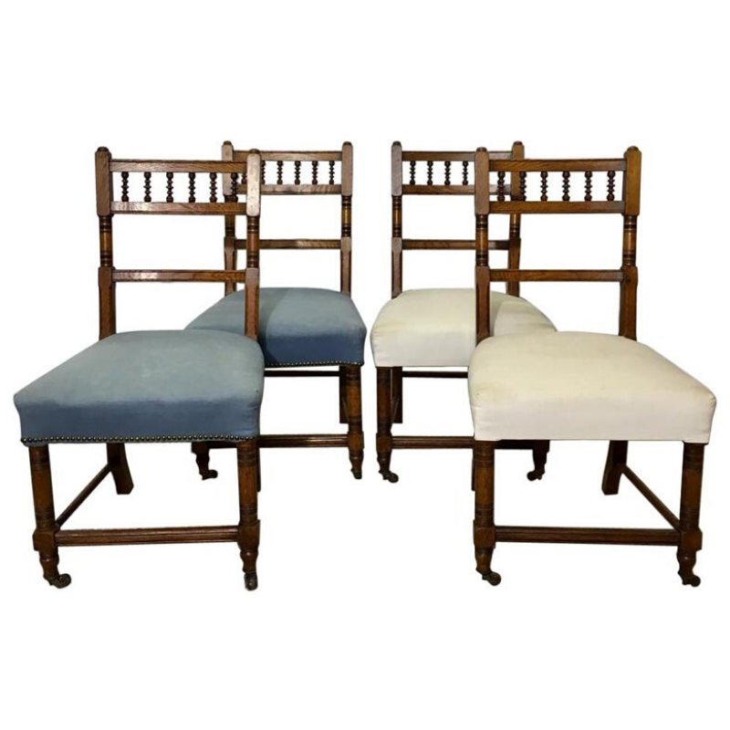 Set of Four Antique Carved Oak Chairs on Wheels