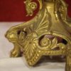 Pair of Italian candlesticks in gilt brass
