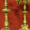 Pair of Italian candlesticks in gilt brass