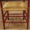 Dutch armchair in red painted wood with floral decorations