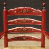 Dutch armchair in red painted wood with floral decorations