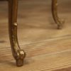 Triptych of Italian side tables in golden brass with marble top