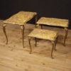 Triptych of Italian side tables in golden brass with marble top