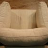 Design armchair in light fabric