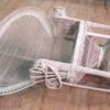 Italian white wicker armchair