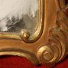 Sculpted and gilded Italian mirror