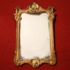 Sculpted and gilded Italian mirror