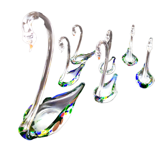 Coloured glass swans