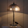 Table lamp in chrome plated steel and grey plexiglass