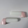 Two pair of mirror lights, designed by Wilhelm Wagenfeld for Lindner, 3rd generation, in light pink