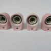 Two pair of mirror lights, designed by Wilhelm Wagenfeld for Lindner, 3rd generation, in light pink