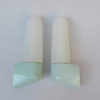 One pair of mirror lights, designed by Wilhelm Wagenfeld for Lindner, 3rd generation, in light green