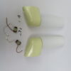 Two pair of mirror lights, designed by Wilhelm Wagenfeld for Lindner, 3rd generation, in light yellow