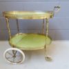 Serving trolley made of brass and marble look, mid century bar trolley, golden tea trolley