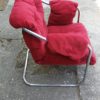 Mid Century red velvet easychair on special chrome legs