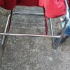 Mid Century red velvet easychair on special chrome legs