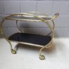 Brass and glass bar trolley, mid century serving trolley with black glass shelves