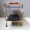Brass and glass bar trolley, mid century serving trolley with black glass shelves
