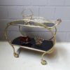 Brass and glass bar trolley, mid century serving trolley with black glass shelves