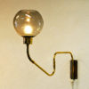Wall lamp on brassarm with glassdome T. Røste & Co Norway 1950s