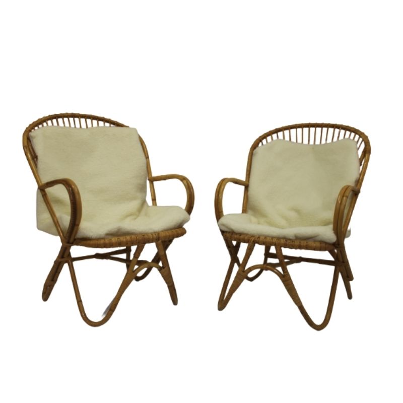 Pair of vintage rattan armchairs year 60 butterfly legs.