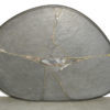 Brutalist oval natural stone coffee table designed by sculptor PAul Kingma, The Netherlands 1995
