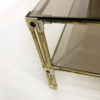 Brass Two-Tiered Coffee Table Hollywood Regency Gold Smoked Glass 1970s Glamour