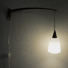 Wall lamp of teak and opaline glass Sweden 1950s