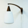 Wall lamp of teak and opaline glass Sweden 1950s