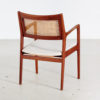 Teak armchair with wicker backrest