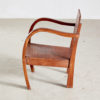 Short teak armchair