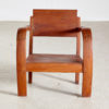 Short teak armchair