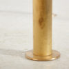 Roundish coffee table on brass legs