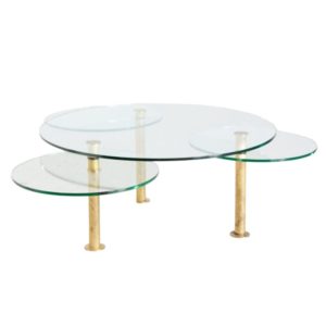 Roundish coffee table on brass legs