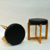 Scandinavian Oak taburette pair with black leatherette seats 1960s