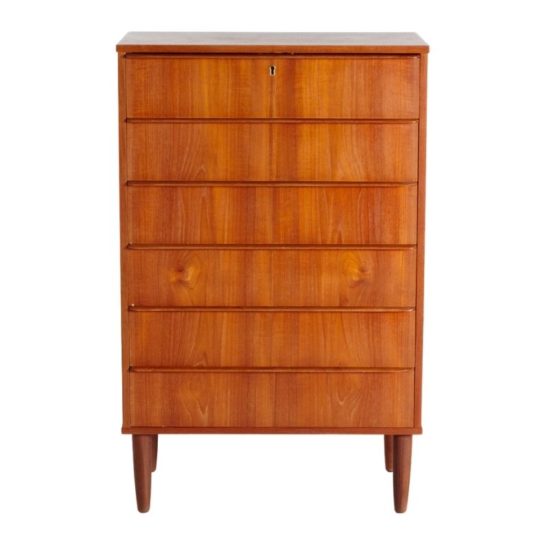 Teak chest of drawers on cylindrical legs