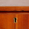 Teak chest of drawers on cylindrical legs