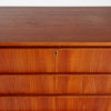 Teak chest of drawers on cylindrical legs