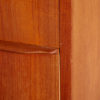 Teak chest of drawers on cylindrical legs