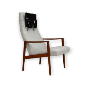 Danish vintage high-backed armchair in teak and cowskind, 1970s