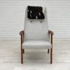 Danish vintage high-backed armchair in teak and cowskind, 1970s